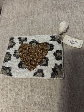 Francesca's White & Silver Beaded Wristlet with Pom